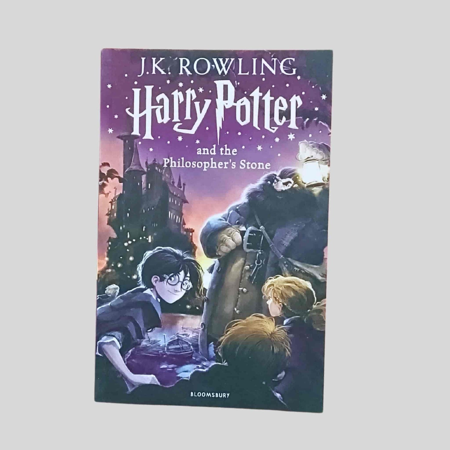 Harry Potter and the Philosopher’s Stone by J. K. Rowling paperback book cover