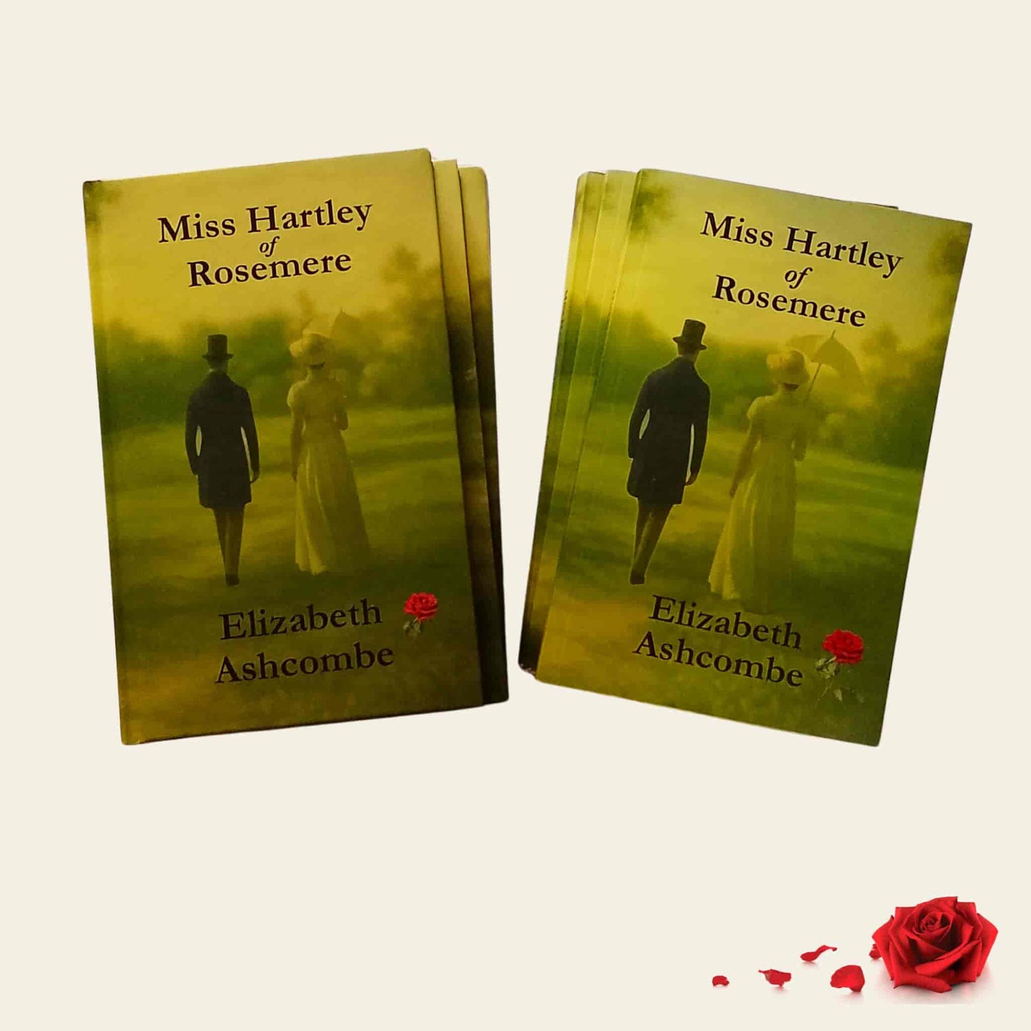 Hardback and paperback copies of Miss Hartley of Rosemere by Elizabeth Ashcombe, a Jane Austen inspired Regency romance novel available from TAWPublishing.co.uk