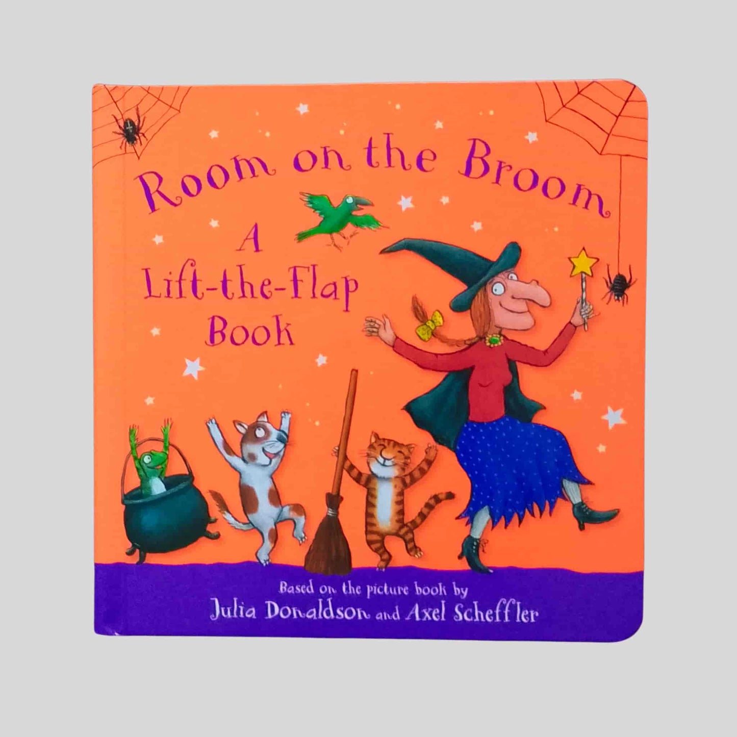 Room on the Broom Lift-the-Flap children’s book by Julia Donaldson and Axel Scheffler – bright orange cover with witch, animals, and broomstick