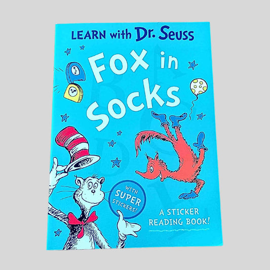 Book cover of 'Fox in Socks' by Dr. Seuss with a blue background and colourful illustrations