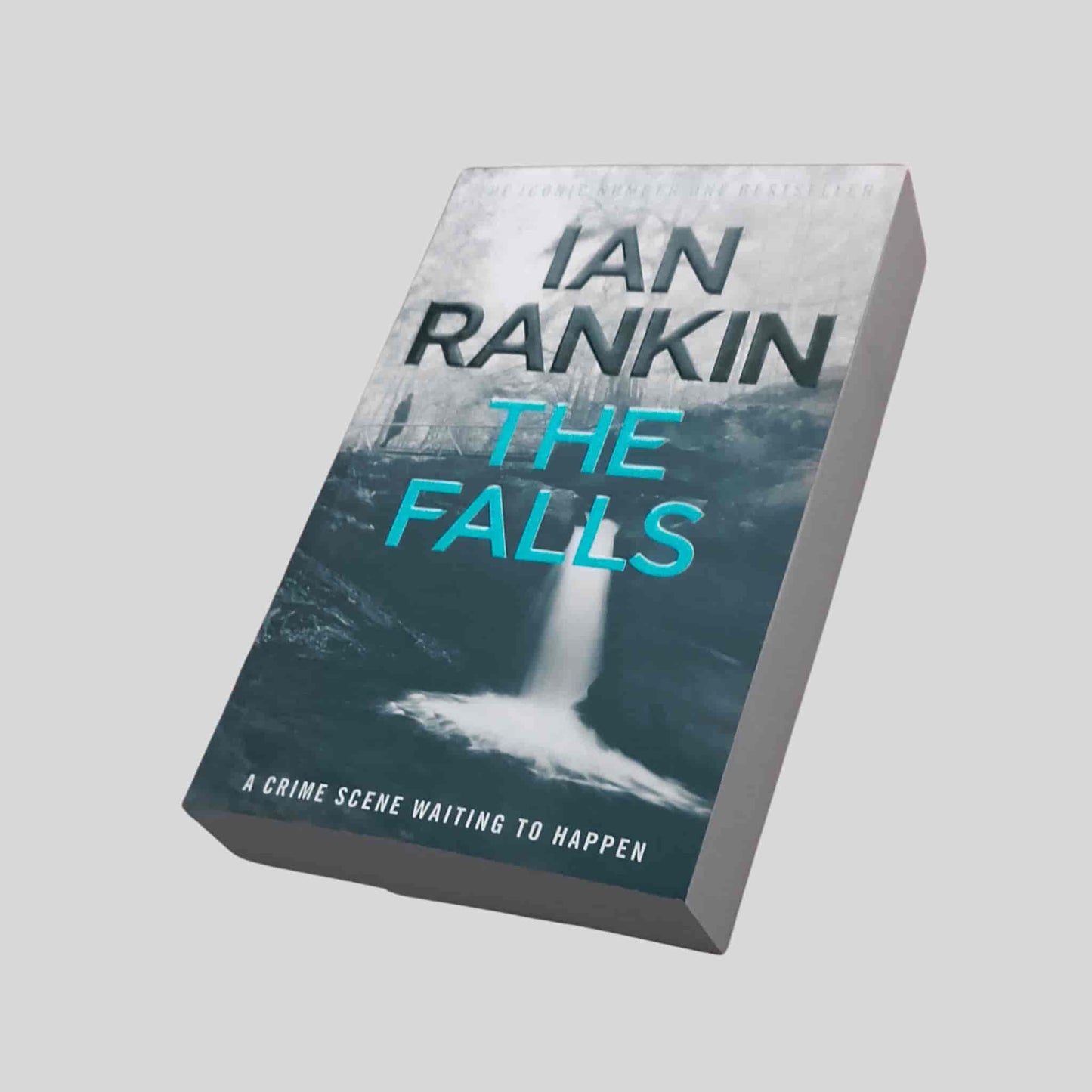 The crime thriller paperback book The Falls by Ian Rankin featuring a waterfall on the cover – a Rebus novel