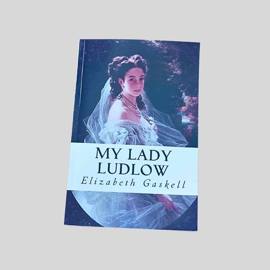 Front cover of My Lady Ludlow by Elizabeth Gaskell, paperback edition, featuring a Victorian woman in a white gown and veil against a dark background