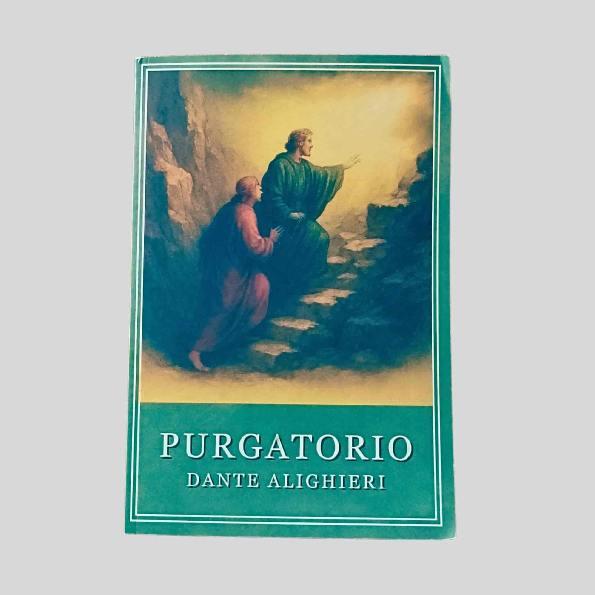 Paperback cover of Purgatorio by Dante Alighieri, depicting an illustrated scene of two figures in medieval dress ascending a rocky path toward light