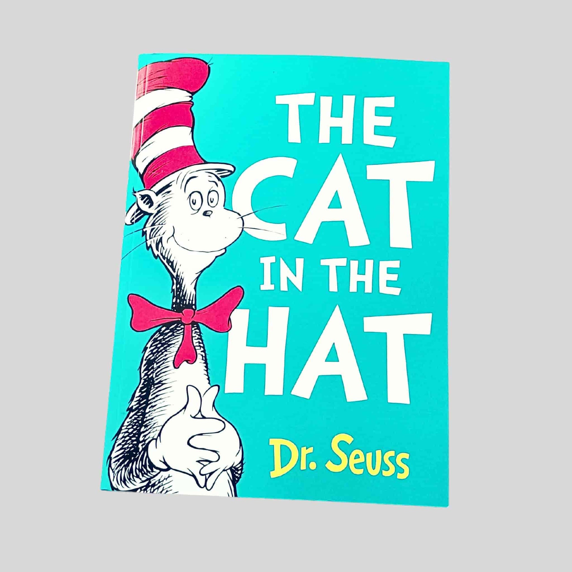 The front cover of The Cat in the Hat by Dr. Seuss, showing the Cat in his red-and-white striped hat on a turquoise background
