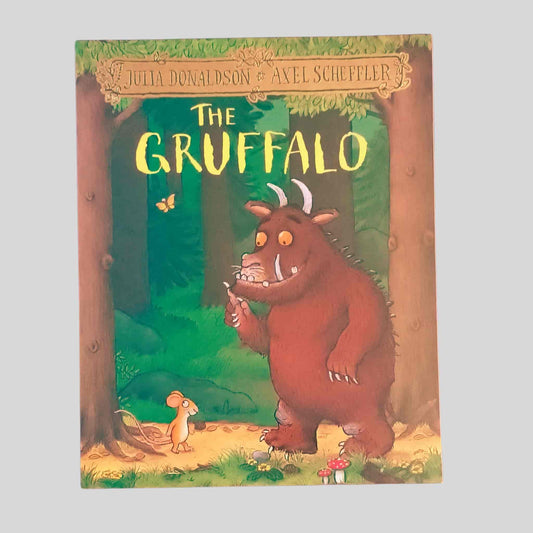 Front cover of the children's book 'The Gruffalo' by Julia Donaldson with a cartoon picture of a Gruffalo and a mouse in a forest