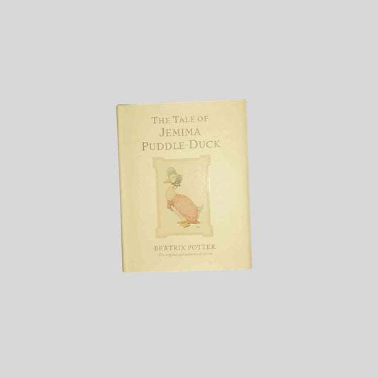 Front cover of the kids book 'The Tale of Jemima Puddle-Duck' by Beatrix Potter on a light grey background