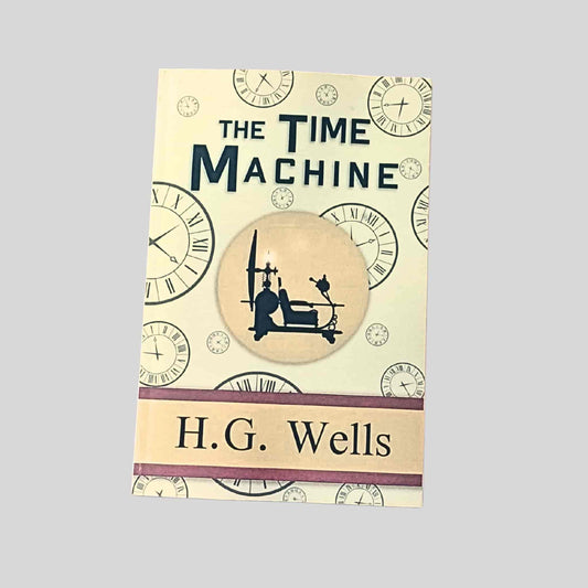 A cream paperback edition of The Time Machine by H. G. Wells, featuring a silhouette of a time traveller seated in a Victorian time machine, surrounded by clock illustrations