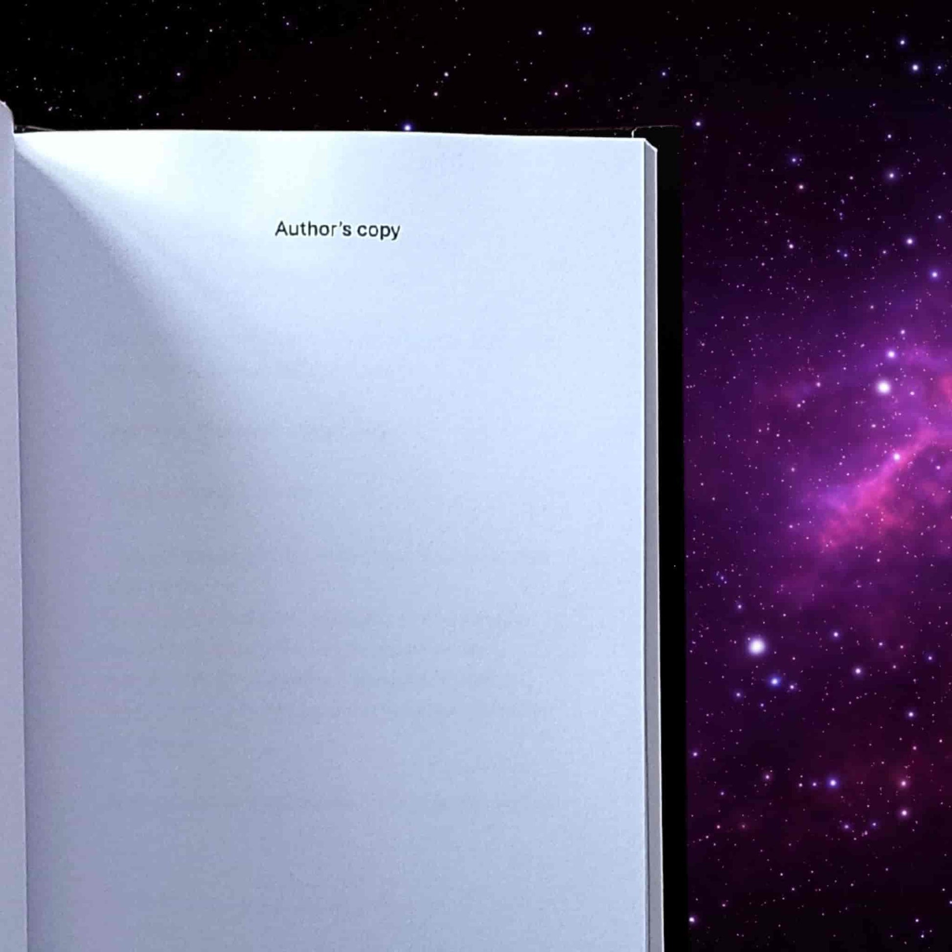 A front-matter page which just has the words “Author’s copy”, from the book The Time Traveller. The book is set against a starry cosmic background
